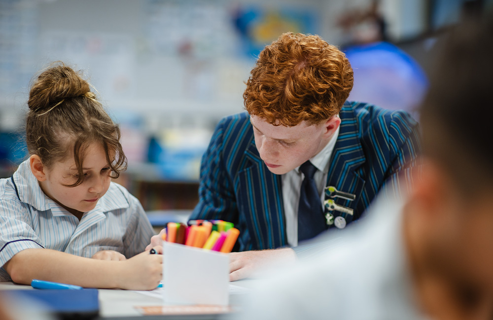 Two Pre-Prep students playing at their room