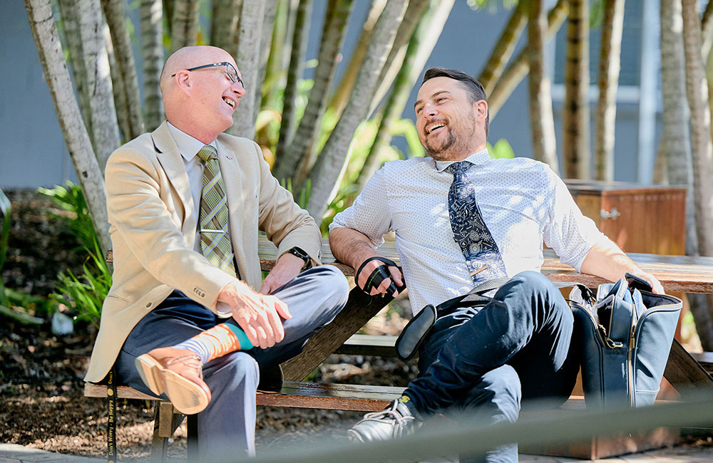 Mr. Alyuz and Mr. Hooker talking to each other